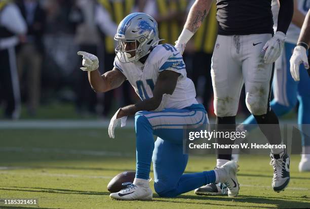 McKissic of the Detroit Lions signals first down against the Oakland Raiders during the third quarter of an NFL football game at RingCentral Coliseum...