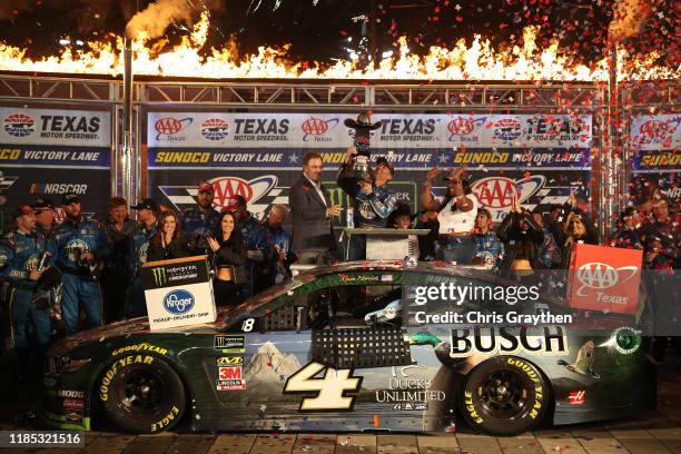 Kevin Harvick, driver of the Busch Beer/Ducks Unlimited Ford, celebrates in Victory Lane after winning the Monster Energy NASCAR Cup Series AAA Texas...