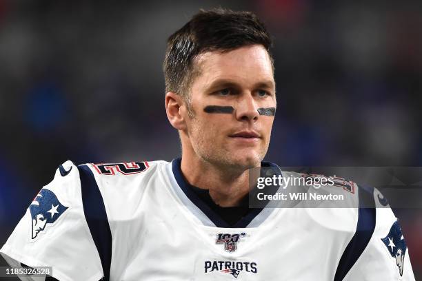 Quarterback Tom Brady of the New England Patriots looks on before playing against the Baltimore Ravens at M&T Bank Stadium on November 3, 2019 in...