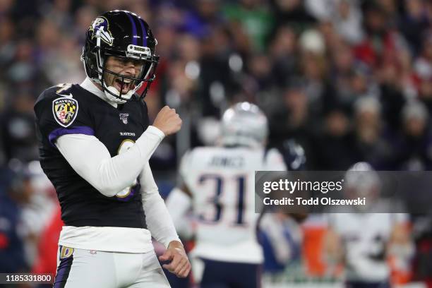 Place kicker Justin Tucker of the Baltimore Ravens reacts after kicking a first quarter field goal against the New England Patriots at M&T Bank...