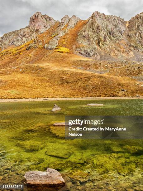fall at clear ruby lake in mountains - ruby mountains stock pictures, royalty-free photos & images