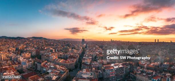 panoramic view of barcelona cityscape and sagrada fimiliar - barcelona aerial stock pictures, royalty-free photos & images