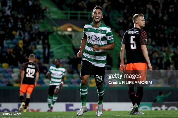 Sporting's Brazilian forward Luiz Phellype celebrates after scoring a goal during the UEFA Europa League Group D football match between Sporting CP...