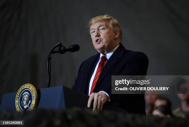 President Donald Trump speaks to the troops during a surprise Thanksgiving day visit at Bagram Air Field, on November 28, 2019 in Afghanistan.