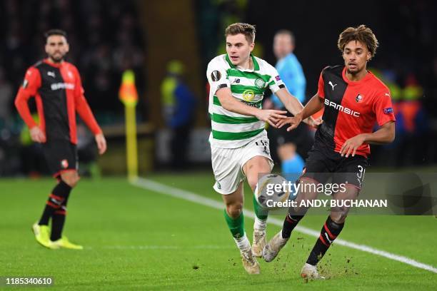 Celtic's Scottish midfielder James Forrest vies with Rennes' French defender Sacha Boey during the UEFA Europa League group E football match between...