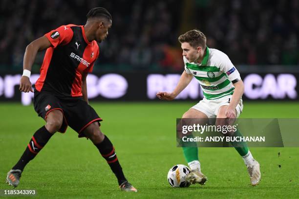 Rennes' French defender Gerzino Nyamsi vies with Celtic's Scottish midfielder James Forrest during the UEFA Europa League group E football match...