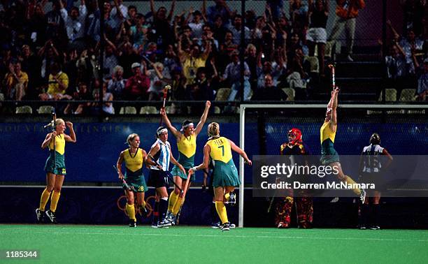 The Australian Women's Hockey Team celebrate their gold medal victory over Argentina during the Women's Hockey Final held at the State Hockey Centre...