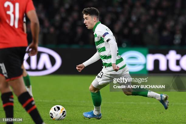 Celtic's Scottish midfielder Michael Johnston runs with the ball during the UEFA Europa League group E football match between Celtic and Rennes at...