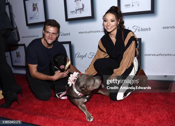 Hartley Sawyer and Jessica Parker Kennedy arrive with Sally and Todd the Pitbulls at the 9th Annual Stand Up For Pits event hosted by Kaley Cuoco at...