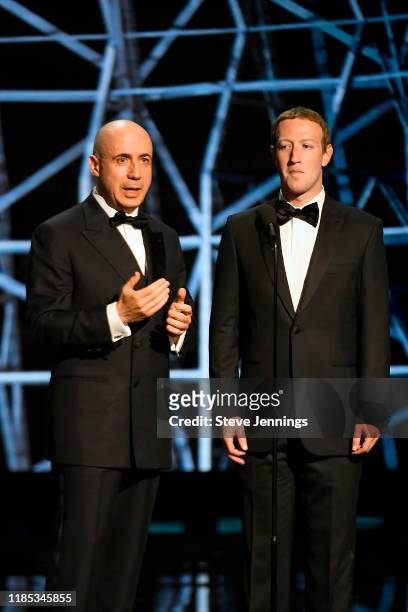 Yuri Milner and Mark Zuckerberg speak onstage during the 2020 Breakthrough Prize at NASA Ames Research Center on November 03, 2019 in Mountain View,...