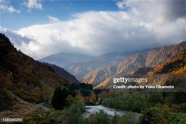 iide mountain range and tamagawa's murmuring - yamagata stock-fotos und bilder