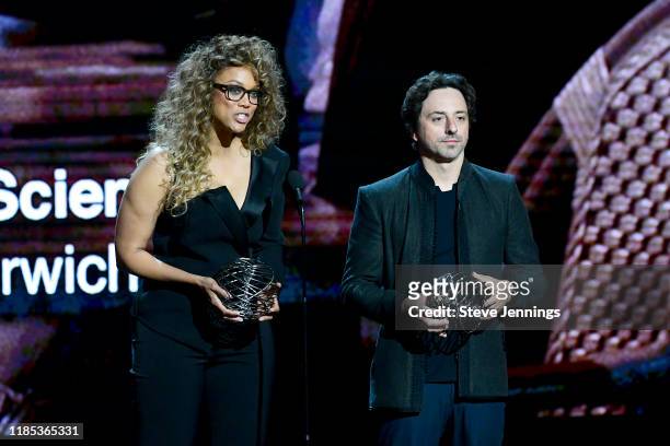 Tyra Banks and Sergey Brin speak onstage during the 2020 Breakthrough Prize at NASA Ames Research Center on November 03, 2019 in Mountain View,...