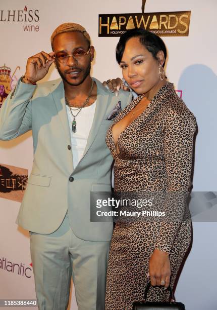 Eric Bellinger and Lamyia Good arrive at the Hollywood and African Prestigious Awards at Alex Theatre on November 03, 2019 in Glendale, California.