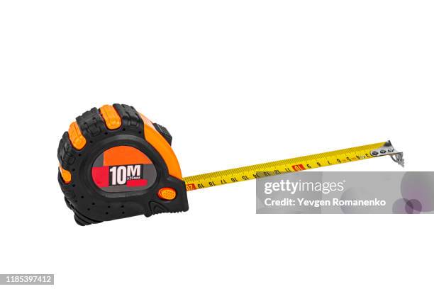 tape measure isolated on white background - lunghezza foto e immagini stock