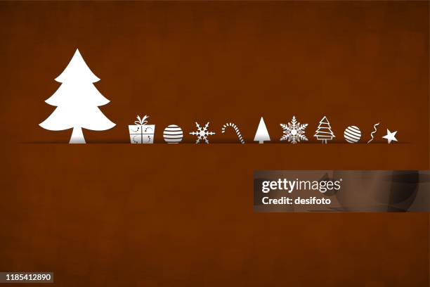 a horizontal vector illustration of a creative dark chocolate brown color xmas background with a slit or cut in the middle and white colored christmas tree and ornaments arranged over it - chocolate background stock illustrations