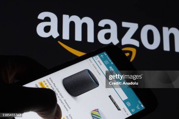 The logo of "Amazon", multinational technology company, is seen with the virtual assistant Alexa developed by Amazon, in Ankara, Turkey on November...