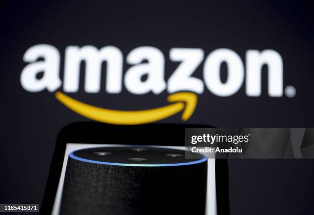 The logo of "Amazon", multinational technology company, is seen with the virtual assistant Alexa developed by Amazon, in Ankara, Turkey on November...