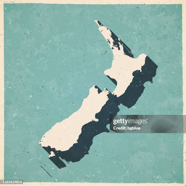 new zealand map in retro vintage style - old textured paper - nz map stock illustrations