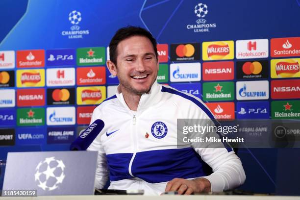 Frank Lampard, Manager of Chelsea reacts during a press conference ahead of their UEFA Champions League Group H match against Ajax at Chelsea...