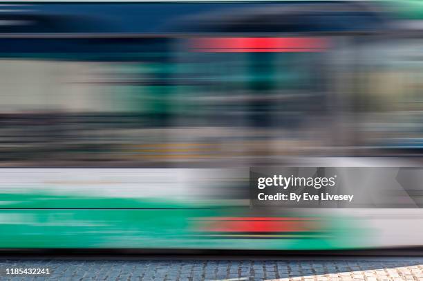 granada light railway carriage passing at speed - passer devant photos et images de collection