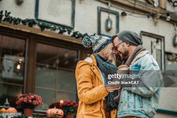 couple on a city break - friendship men yellow stock pictures, royalty-free photos & images