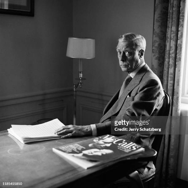 Portrait of former British King Edward VIII, the Duke of Windsor . Dressed in a suit and tie, as he sits at his desk at the Waldorf Astoria hotel,...