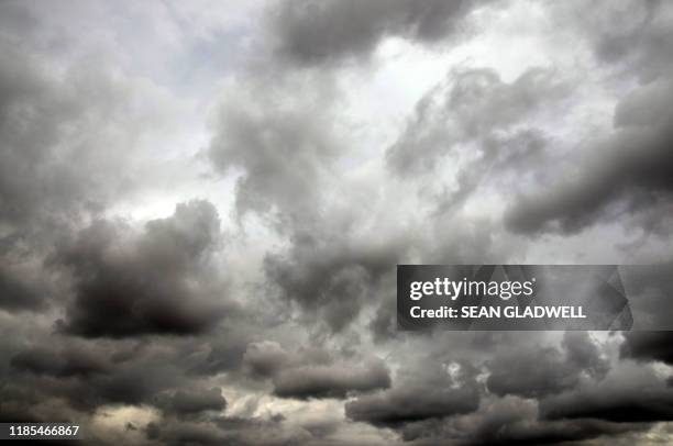 stormy sky - stratus stock-fotos und bilder