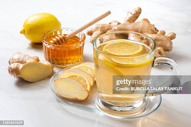 ginger tea with lemon and honey - ginger root stock pictures, royalty-free photos & images