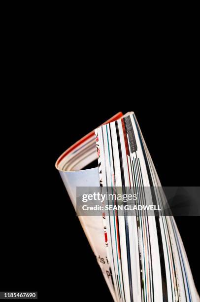 Magazine Roled 7,843 Tabloid Magazine Stock Photos, High-Res Pictures, and Images ...