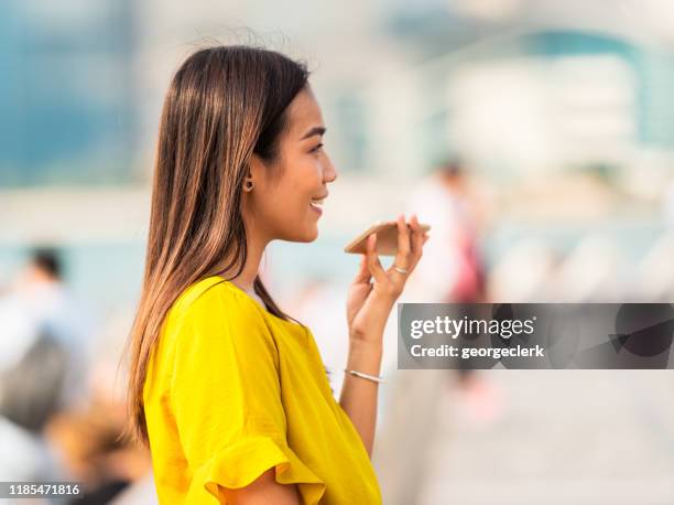 enjoying a phone call - conference phone stock pictures, royalty-free photos & images