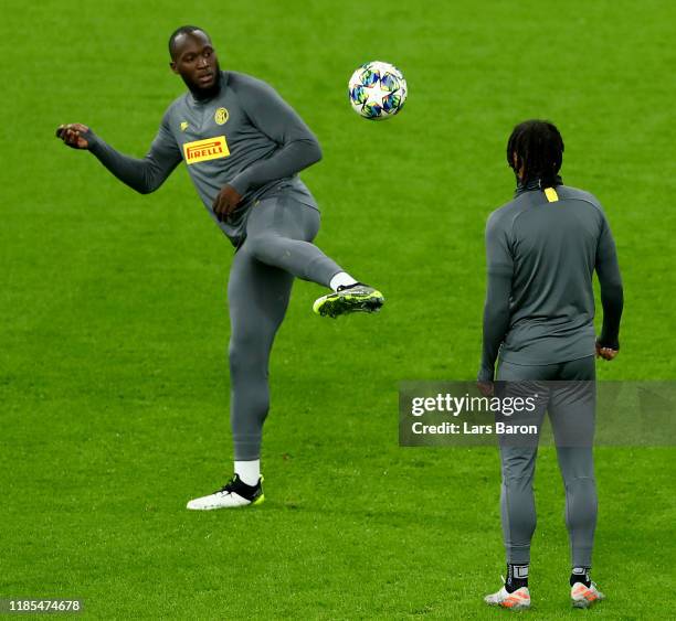 Romelu Lukaku plays the ball to Valentino Lazaro during a FC Internationale training session at Signal Iduna Park on November 04, 2019 in Dortmund,...