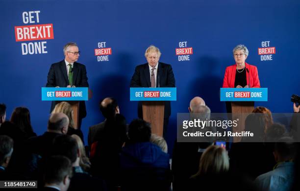 British Prime Minister Boris Johnson speaks at a press conference alongside cabinet minister Michael Gove and former Labour Party MP Gisela Stuart on...