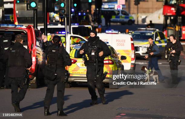 Metropolitan Police Armed Response officers gather near Borough Market after reports of shots being fired on London Bridge on November 29, 2019 in...