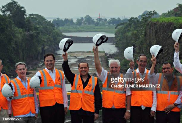 Colombian President Alvaro Uribe, Panamanian Foreign Minister Juan Carlos Varela, Italian Prime Minister Silvio Berlusconi, Panamanian President...
