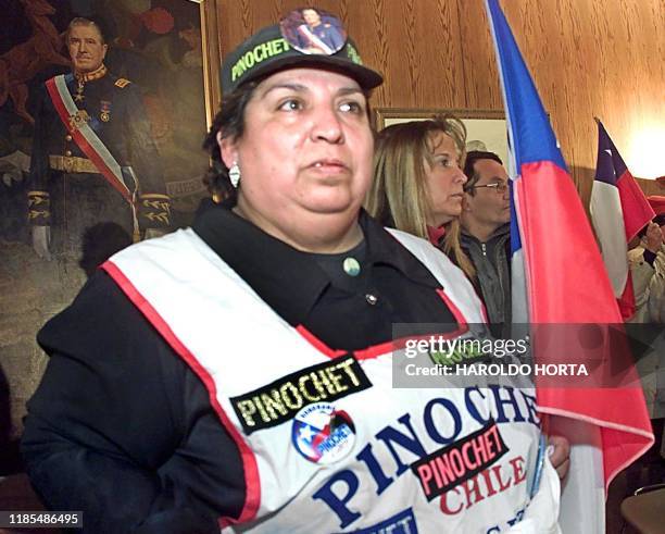 Supporters of the former Chilean dictator and senator Augusto Pinochet listen the premises of the Pinochet Foundation in Santiago, Chile, 01 August...