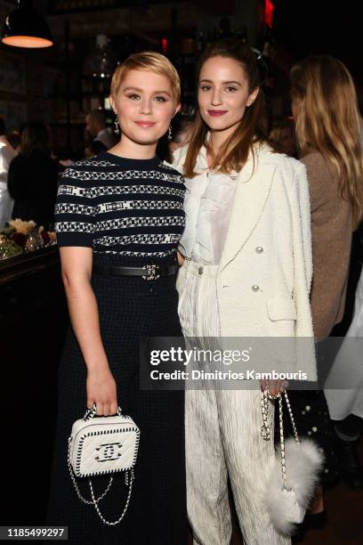 Eliza Scanlen and Dianna Agron, both wearing Chanel, attends Through Her Lens: The Tribeca CHANEL Women's Filmmaker Program Luncheon at Locanda Verde...