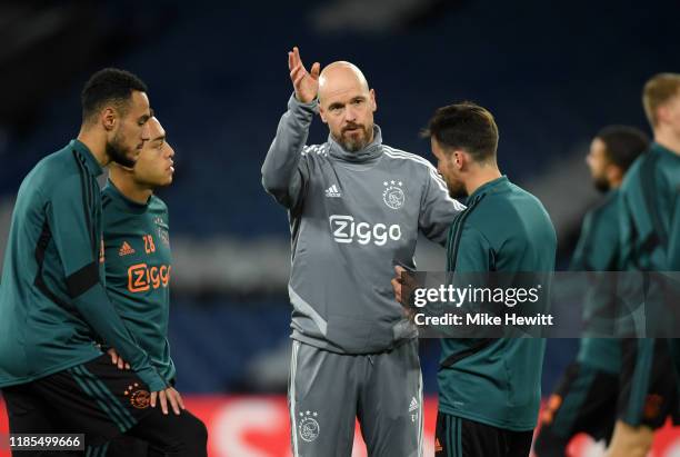 Erik Ten Hag, Manager of Ajax gives his team instructions during a training session ahead of their UEFA Champions League Group H match against...
