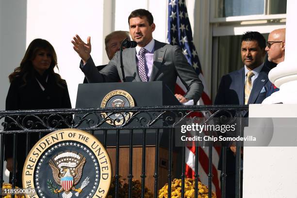 Washington Nationals first baseman Ryan Zimmerman makes brief remarks with U.S. President Donald Trump, first lady Melania Trump, Manager Dave...