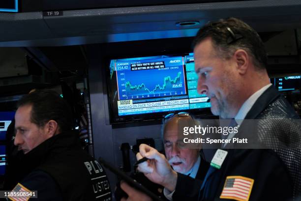 Traders work on the floor of the New York Stock Exchange on November 04, 2019 in New York City. U.S. Stocks finished at records highs on Monday with...