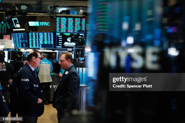 Traders work on the floor of the New York Stock Exchange on November 04, 2019 in New York City. U.S. Stocks finished at records highs on Monday with...