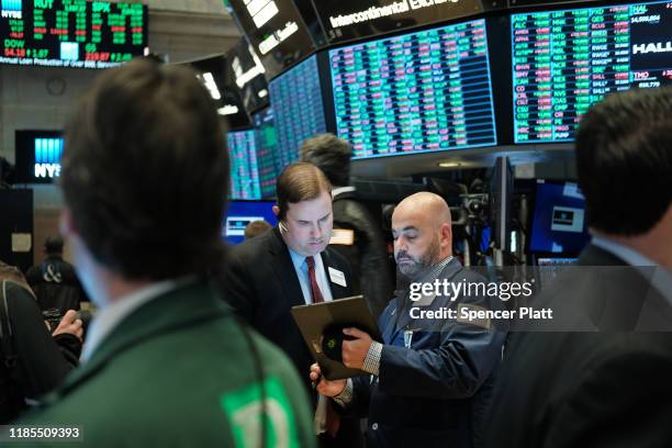 Traders work on the floor of the New York Stock Exchange on November 04, 2019 in New York City. U.S. Stocks finished at records highs on Monday with...