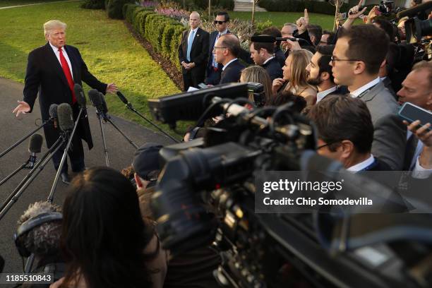 President Donald Trump talks to journalists while departing the White House November 04, 2019 in Washington, DC. Trump is traveling to Kentucky for a...