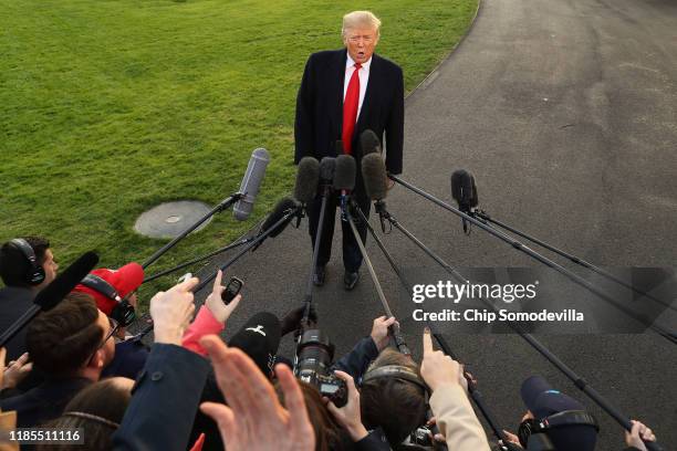 President Donald Trump talks to journalists while departing the White House November 04, 2019 in Washington, DC. Trump is traveling to Kentucky for a...