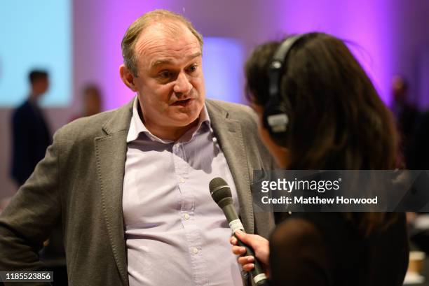 Deputy Leader of the Liberal Democrats Ed Davey speaks to journalists in the spin room following a BBC election debate between UK political party...