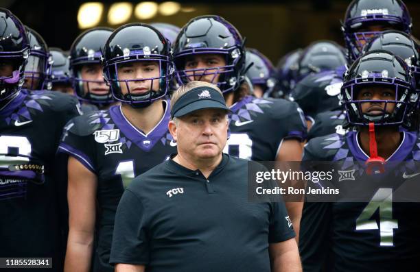 Head coach Gary Patterson of the TCU Horned Frogs waits with players before being introduced before the game with the West Virginia Mountaineers at...