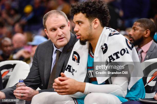 Head coach Taylor Jenkins talks with Dillon Brooks of the Memphis Grizzlies during a game against the Utah Jazz during the first half at FedExForum...