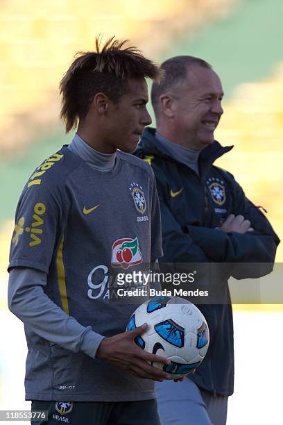 Neymar and coach Mano Menezes of Brazil during a training session at the Mario Kempes Stadium on July 08, 2011 in Cordoba, Argentina. Brazil will...