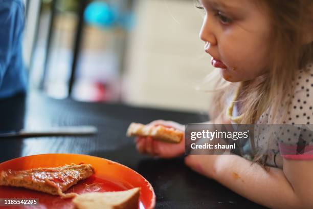 girl eating lunch - food allergy stock pictures, royalty-free photos & images