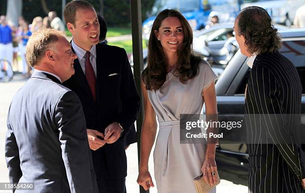 Prince William, Duke of Cambridge and Catherine, Duchess of Cambridge are greeted by Head of News, UKTI Clive Bull and Neil Stiles, President of...