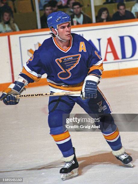 Adam Oates of the St. Louis Blues skates against the Toronto Maple Leafs during NHL game action on October 24, 1990 at Maple Leaf Gardens in Toronto,...